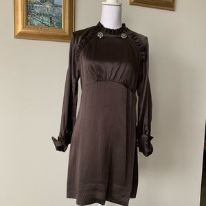 Beautiful with rhinestone detail and sleeve cuff classic dress